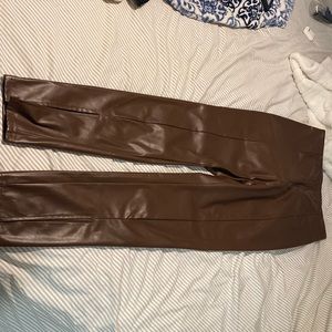 brown faux leather pants with front slit